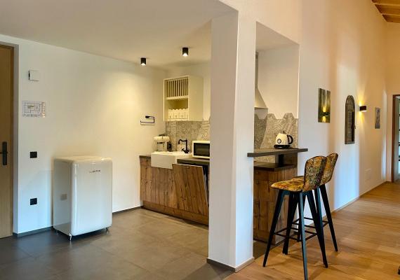 Modern kitchen in an open-plan living area.