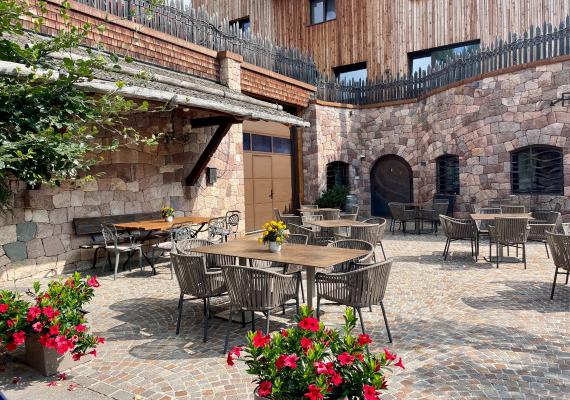 Sun terrasse of the Pizzeria at SchartnerAlm